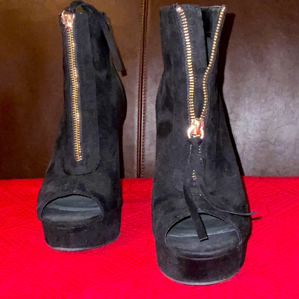 Women’s black heeled booties